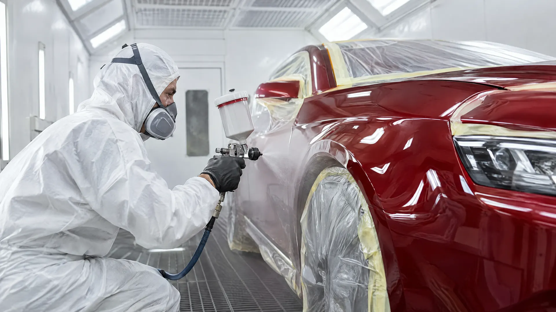 Clearcoat going on in the downdraft booth